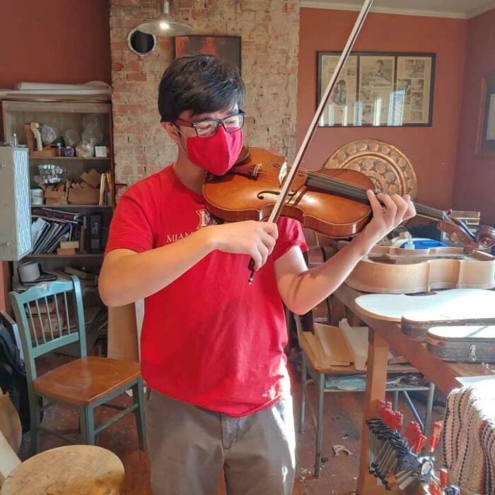 Chris Pacleb playing violin