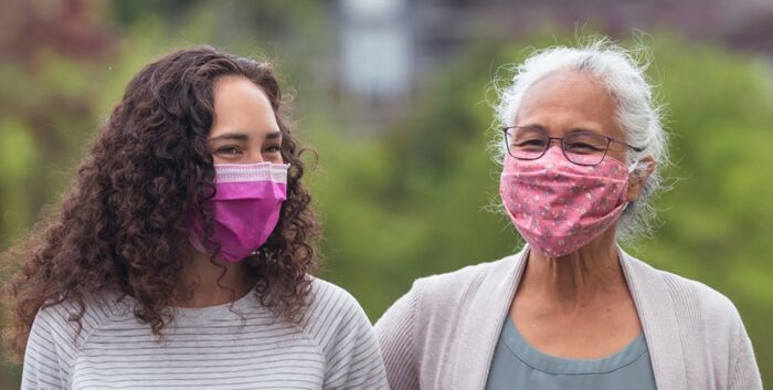 Two people in masks